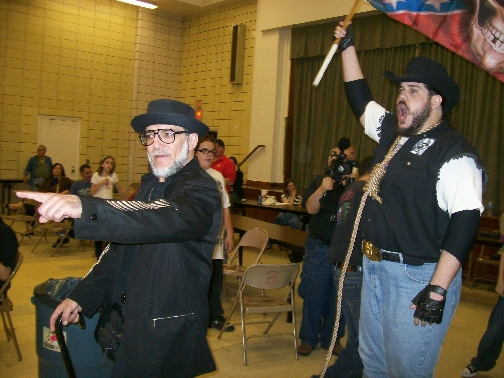 Mr. WOOD leads BIG RON to the ring.