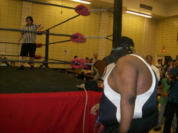 LUCIFER DARKCYDE approaches the ring.
