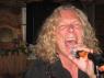 JOHN belting one out.