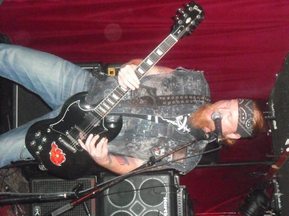 PAT wields a wicked guitar.