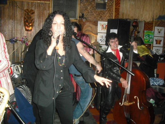 DINA REGINE sings with JOHNNY ANGEL on the upright bass.