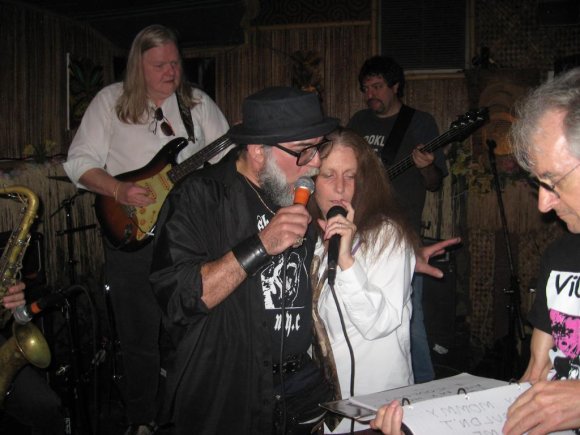 Mr. WOOD and LAURA PINTER read as PETER prompts with the LYRICS>