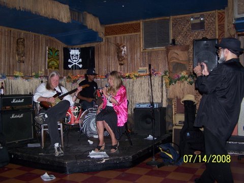 WILD BILL THOMPSON, JESSE and JOY RYDER and Mr. WOOD taking pictures.