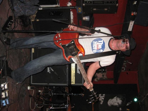 JIM relaxing between songs.