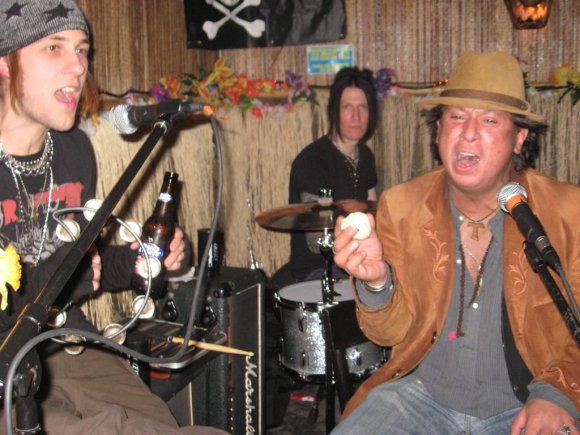 DEL, JAY and SANTOS all doing percussion.