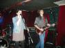 JAMIE sings while ROBBIE the K plays guitar.