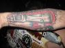 RUCKUS' TIKI GOD tattoo on his right arm!