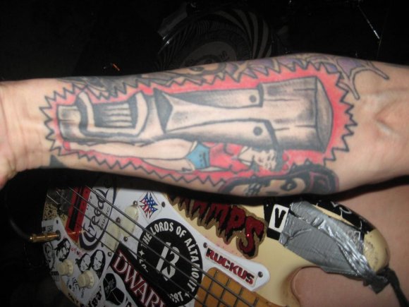 RUCKUS' TIKI GOD tattoo on his right arm!