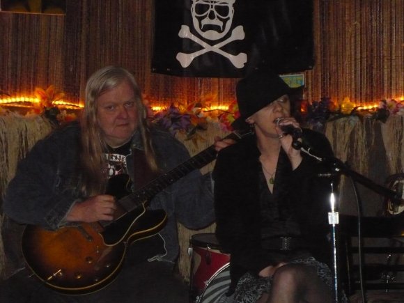 WILD BILL plays while EMMA sings.