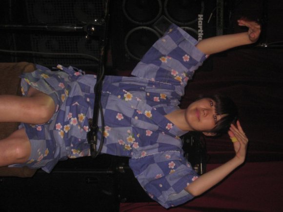 MISA dances sitting down.