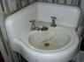 Bathroom sink in back room of SPIKE HILL, a classic.