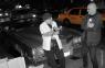 Mr. WOOD and LUNDO talk in front of LUNDO's '72 Cadillac Eldorado convertible.
