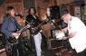 BOBBY R. and ROMAN watch as Mr. WOOD brings PHILLIPPE de BUCKETTE to the stage!