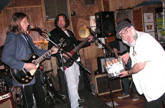 BOBBY R. and ROMAN watch as Mr. WOOD brings PHILLIPPE de BUCKETTE to the stage!
