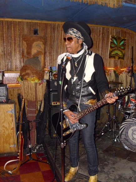 BUDDY BOWZER playing guitar