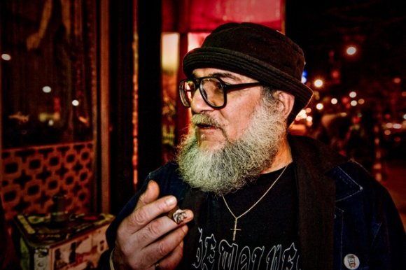 Mr. WOOD talks away with the ever present cigar, close by.