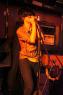ALEX also plays the harmonica.