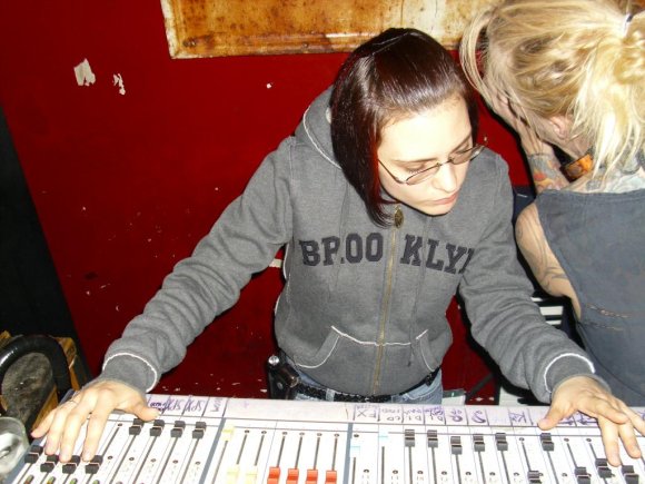ERIN and JETTE in the sound/DJ booth.