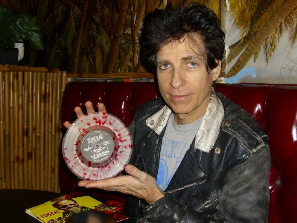 BOBBY STEELE of THE UNDEAD with the Blood-splattered version of his new/old 45 of I WANT YOU DEAD!