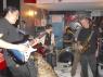 That's a 3 legged dog humping the guitar player.