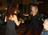 FRANCINE and friend dance to the LOVE PIRATES as PETE looks on.