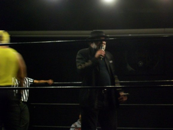Mr. WOOD calling out scheduled wrestler, MANSLAUGHTER.