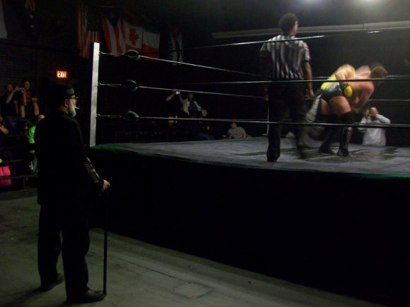 Mr. WOOD watches as MOE SEXTON starts to take over.