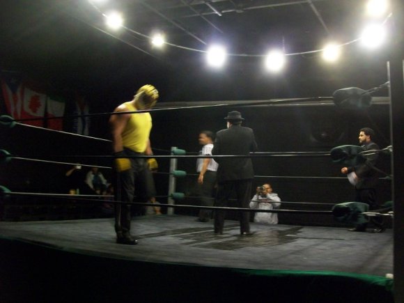 Mr. WOOD harrassing the crowd as TIBERIUS awaits MANSLAUGHTER's entrance.