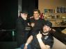 Mr. WOOD and BIG RON joined at the merch table by GEORGE CRISIS.