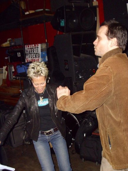 JANIS SHAW (THE CRAYOLAS) dancing with a fan.
