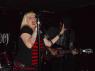 MANDY wails with STURGIS in the shadows.