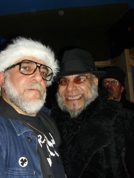 Mr. WOOD and FATHER VINCENT (Head of OTTO's SHRUNKEN HEAD SECURITY)