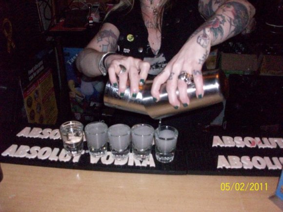 TRACY setting up some drinks.