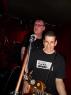 JOE mic'ing DOUG's guitar (I think, or is something else going on?)