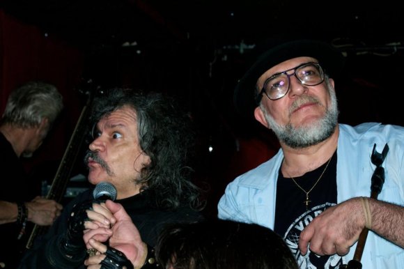 JOHN grabs the mic.
