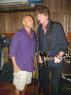 PHIL jumps up and harmonizes with DAVID