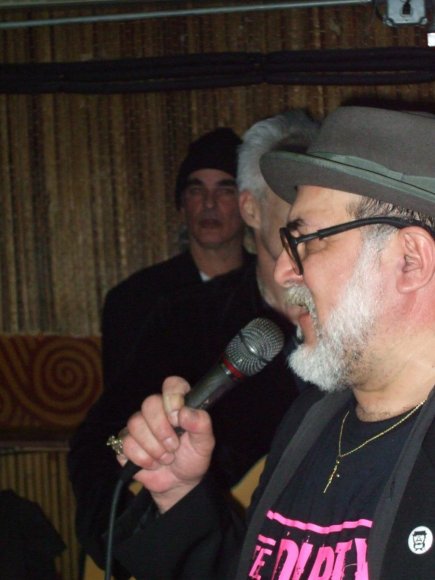 STUY TOWN WILLIE watches as FRANK "sings?".