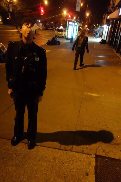 MARTY SHEEHAN blows smoke as RICK heads to the corner store!