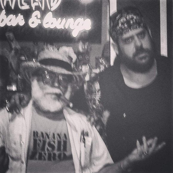 Mr. WOOD and his Wrestler BIG RON PRICE are caught by Clandestine camera as they plot ???