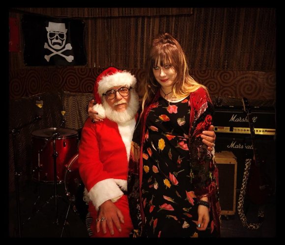 AMANDA FLOWERS sitting on WOODY CLAUS' lap!