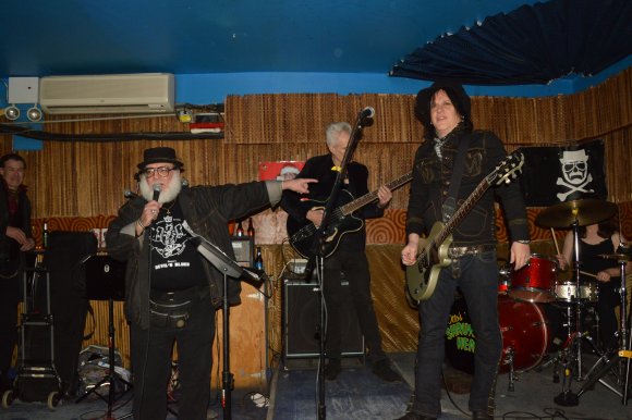 GERARD watches as Mr. WOOD introduces DANNY's DEVIL's BLUES!