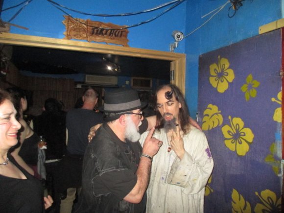 MARIANNE RUSCILLO watches as Mr. WOOD makes a deal with SATAN!